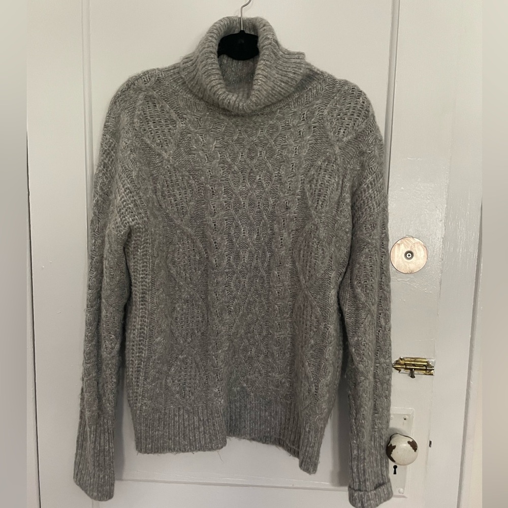 Olivaceous cable knit turtleneck sweater. Size medium.